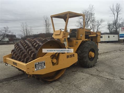 pad foot roller for skid steer|skid steer vibration roller.